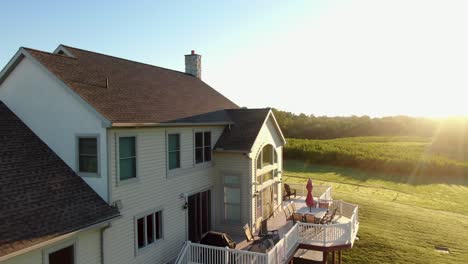 Aerial-view,-rear-of-home-with-large-deck-for-outdoor-living