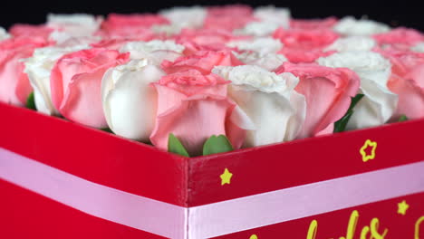 Box-of-roses-white-and-pink-spinning-detail-shot-shallow-depth-of-field