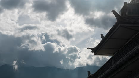 Dramatic-cloud-time-lapse-over-traditional-Chinese-rooftop-architecture