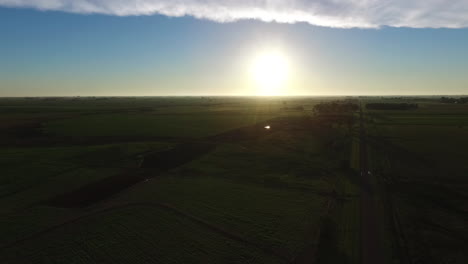 Summer-Sunset-Above-Flat-Farming-Land-in-Countryside-of-Argentina,-Aerial-View