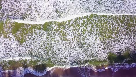 Ocean-Waves-Rolling-on-Beach-Top-Down-Aerial-View