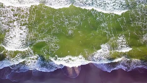 Sea-Waves-Rolling-on-Beach-Top-Down-Aerial-View