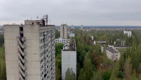 Drone-Shot-Of-Destroyed-Buildings-In-The-Abandoned-City-Of-Pripyat-In-Ukraine---Chernobyl-Disaster---aerial