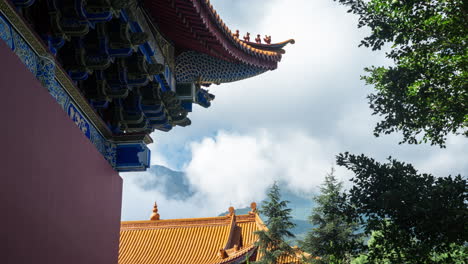 Time-lapse-of-cloud-formation-over-traditional-oriental-Chinese-building-rooftop