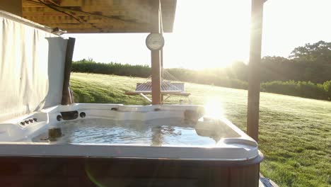 Steaming-hot-tub-ready-as-sun-reflects