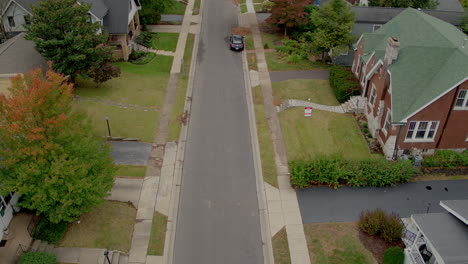 Overhead-view-of-suburban-street-with-a-tilt-up-to-the-horizon