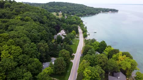 A-drone-shot-showing-off-the-beautiful-property-near-Traverse-City,-Michigan