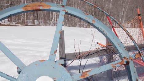 Ski-tow-rope-wheel-slowly-turning-in-a-winter-landscape
