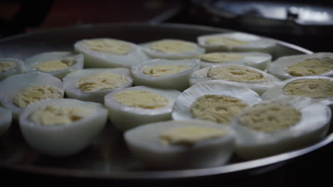 egg-bomb-recipe-boiled-egg-half-cut-in-a-plate-deviled-eggs