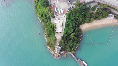 Communication-and-Radar-tower-in-Hong-Kong-bay,-Aerial-view