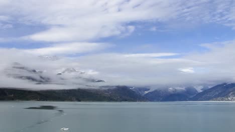Low-clouds-on-top-of-the-mountains-in-Glacier-Bay-National-Park,-Alaska