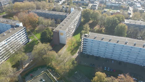 Aerial-of-social-housing-flats-with-green-parks-in-autumn