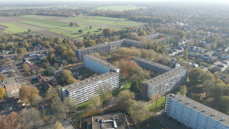 Aerial-of-distant-social-housing-apartment-buildings---drone-pulling-back