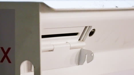 White-Mail-Slot-for-Letters-and-Envelopes-With-Lock-and-Red-X-Close-Up