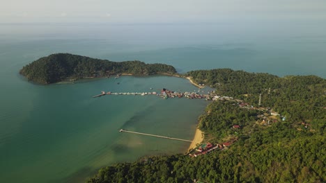 Expansive-aerial-view-of-Bang-Bao-pier-and-the-coast-of-Koh-Chang-island-in-Thailand