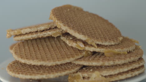 Pile-on-stroopwafels-lying-on-a-white-plate---fast-dolly