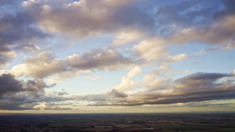 Heavenly-Hyper-lapse-drone-time-lapse-of-soft-clouds-passing-fast-over-in-the-sky