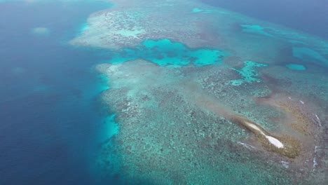 4K-Aerial-view-top-view-drone-move-over-beautiful-turquoise-water