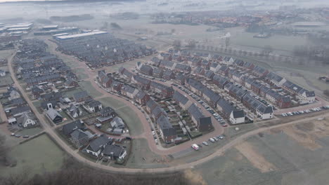 Aerial-of-newly-build-suburban-neighborhood-with-solar-panels-on-rooftop