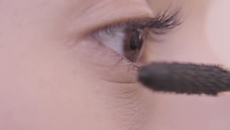 Closeup-of-young-white-woman's-brown-eye