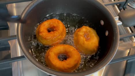 Frying-home-made-donuts-in-vegetable-oil