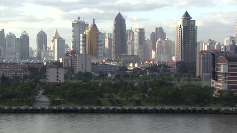Cityscape-of-Shanghai,-China-filmed-from-the-harbor-area
