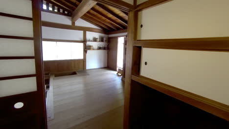 Steadicam-shot-moving-through-hall-and-into-traditional-Japanese-kitchen