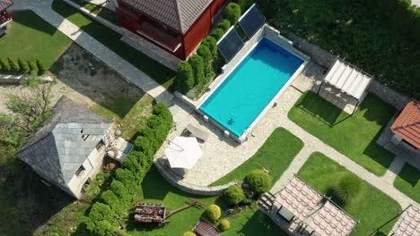 Aerial:-beautiful-holiday-villa-and-swimming-pool-in-Serbian-mountains