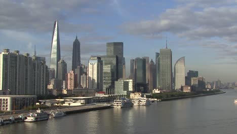 Skyscrapers-in-Lujiazui,-Shanghai,-China-filmed-from-the-harbor-area