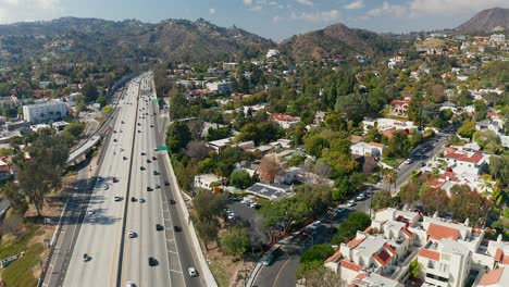 Aerial-view-of-Hollywood-Dell,-the-Hollywood-Hills,-and-the-101-Freeway