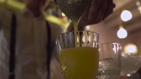 Bartender-preparing-cocktails-in-a-vintage-bar-HD,-SonyAlpha