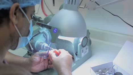 closeup-shot-for-a-technician-preparing-a-denture