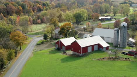 American-rural-farm-with-two-red-barns-and-silos
