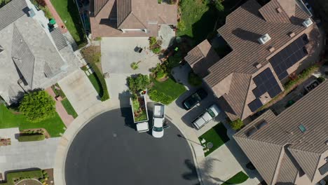 Aerial-view-of-landscapers-working-in-a-residential-neighborhood