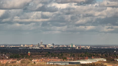 A-windy-Spring-sky-moving-quickly-across-Birmingham-City-Centre-in-the-West-Midlands,-England