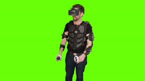 Super-easy-green-screen-virtual-reality-playing-guy-technology-advanced-vest-with-motion-tracker-capture-shooting-oculus-quest-2-mixed-augmented-vr-ar-xr-futuristic-headset-gamer-nerdy-gaming-htc-vive