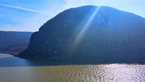 Aerial-drone-footage-of-the-Appalachian-mountains-over-a-river-valley-in-new-york-in-the-hudson-river-valley-looking-at-storm-king-mountain-in-early-spring