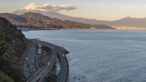 Timelapse-of-Mt-Fuji,-ocean-and-road-from-Satta-Pass-in-Shizuoka,-Japan