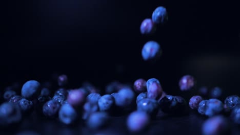 Blueberries-fall-on-the-black-table