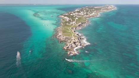 High-Aerial-of-Isla-Mujeres,-Mexico-Helicopter-view