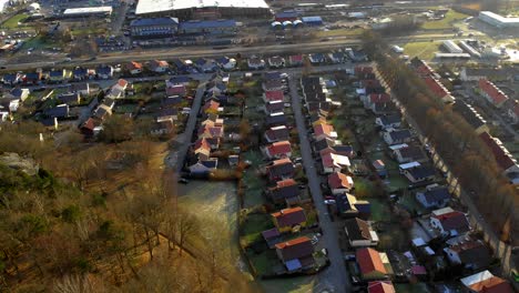 Aerial-Shot-Of-Housing-Development-At-Sunrise-In-Sweden,-Houses-In-Urban-Community