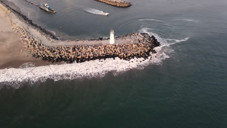 Aerial-view-of-Santa-Cruz-Breakwater-Lighthouse-shot-in-4k-high-resolution