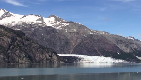 Snow-capped-mountain-and-Margerie-Glacier-in-the-summertime-in-Alaska