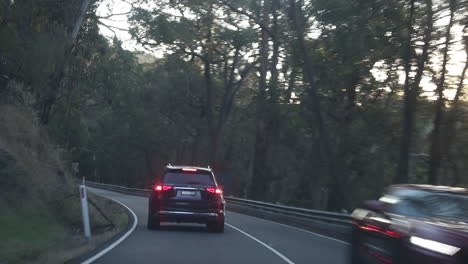 Point-of-view-of-driver-or-passenger-driving-along-non-descriptive-Australian-mountain-highway