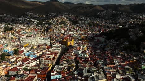 AERIAL:-DRONE-DOLLY-IN-SHOT-OF-GUANAJUATO-BASILICA-FROM-FAR-AWAY