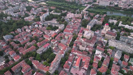 Aerial-drone-shot-of-Plovdiv-Old-town,-Bulgaria-with-Roman-theatre-of-Philippopolis,-Djumaya-Mosque,-Clock-Tower