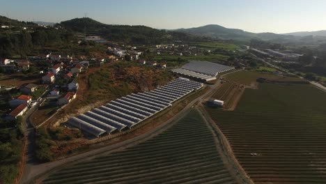 Industrial-Greenhouses-and-Agriculture-Fields-Aerial-Shot