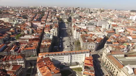 AERIAL-DRONE-FOOTAGE---The-Porto-City-Hall-is-perched-atop-the-Avenida-dos-Aliados,-or-the-Avenue-of-the-Allies-in-Porto,-Portugal