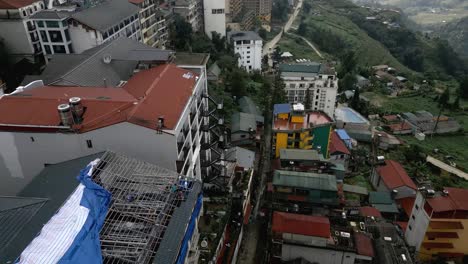 Tiltin-aerial-rooftop-shot-of-a-city-in-Vietnam
