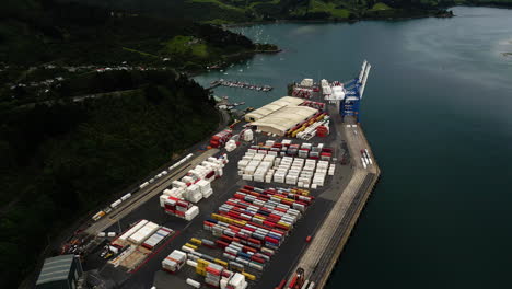 Industrial-cargo-port-in-Dunedin-city,-New-Zealand,-aerial-drone-view